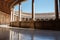 upper floor of the Palace of Charles V with colonnades and circular corridor with wooden coffered ceiling