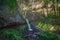 Upper Horsetail Falls flowing over a cave