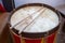 The upper part of the drum with wooden sticks.