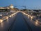 upper platform of the D.Luis I bridge in Porto with the passage of the metro at night.