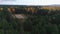 Upper view construction site among pine and birch forest