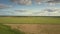 Upper view rural landscape with boundless fields under sky