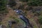 Upper watercourse of creek near Bilina river in Krusne hory mountains in evening