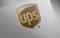 Ups-united-parcel-service on paper texture