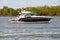 Upscale Cabin Cruiser at Anchor in Haulover Beach Inlet