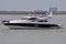 Upscale Cabin Cruiser at Anchor in Haulover Beach Inlet