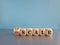 Upscale or downscale symbol. Concept red words Upscale or Downscale on wooden cubes. Beautiful grey table blue background.