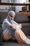 Upset arabian woman in hijab sitting