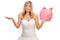 Upset bride holding a piggybank and gesturing with her hand