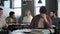 Upset distressed hispanic male student sitting at desk in classroom alone feels disappointment sadness melancholy