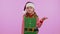 Upset girl in Christmas costume making face palm gesture, feeling bored, disappointed, bad result