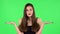 Upset girl shrugs and shakes her head negatively. Green screen