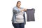 Upset overweight woman holding a shrunken shirt