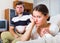 Upset spouses after domestic quarrel.