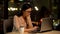 Upset woman typing on laptop working at night, project deadline, tasks overload