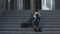 Upset young businessman in frustration outside office department. Fired unhappy caucasian bearded man losing job crying