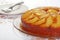 Upside down pear cake with plates and forks