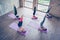 Upside down seal pose. Topview of five pretty young slim ladies, stretching by doing shoulderstand exercise, wearing fashionable