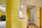 Upstairs hallway with bright yellow wall