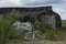 Upturned disused boat repurposed as a shed