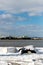 Upturned row boats have been left moored on the beach on the Suffolk coast. They have been covered in snow after a rare snow storm