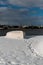 Upturned row boats have been left moored on the beach on the Suffolk coast. They have been covered in snow after a rare snow storm