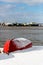 Upturned row boats have been left moored on the beach on the Suffolk coast. They have been covered in snow after a rare snow storm