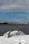 Upturned row boats have been left moored on the beach on the Suffolk coast. They have been covered in snow after a rare snow storm