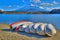 Upturned rowing boats on the shores of Lake Shoji with Mount Fuji in the background