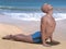 Upward-facing dog pose bald man