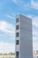 Upward view of elevator tower of new apartment building under construction in Texas, USA