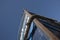 Upward view of a ships prow looking up at clear blue sky