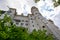 Upwards view of romantic architectural details of fairytale castle.