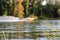 Uralsk, Kazakhstan - July 17 2014: boat with tourists at high speed floating on the river