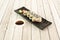 Uramaki california roll sushi tray with fresh cheese, nori seaweed,