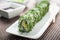 Uramaki sushi vegi green maki on a dish