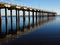 Urangan Pier and Reflection on clear blue skies and sea