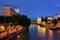 Urania Observatory building and Aspernbrucke at night, seen from Schwedenbrucke in Viena.