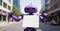 Urban Advocate: Purple Robot with Message