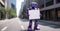 Urban Advocate: Purple Robot with Message