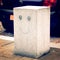 Urban art retro filter. Smiling Parking Stone Pillar - vintage effect.