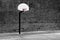 Urban Basketball Hoop Inner City Wall and Asphalt