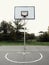 Urban Basketball hoop at sunset with skyline