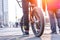 Urban biking - teenage boy riding bike in city