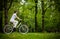 Urban biking - woman riding bike