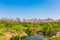 Urban buildings under the blue sky in the morning, beautiful cities, green houses