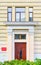 Urban city classic style building with decorative entrance. Old town house