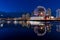 Urban city night, Vancouver marina twilight panoramic view. Skyline and buildings lights reflection