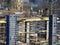 urban development. construction site in winter during the day. workers in uniform prepare the scaffolding