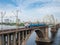 Urban electric multiple unit on bridge across river, Kyiv, Ukraine